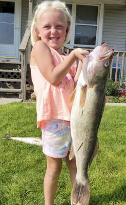 Daryl Deibler with her 27.5” walleye caught at Merritt