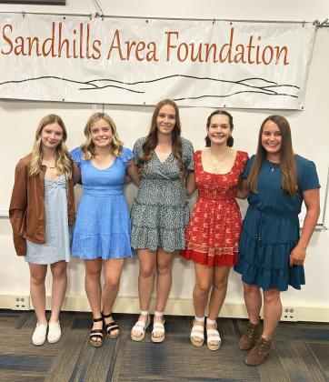 Five Mullen High School graduates were awarded Sandhills Area Foundation Scholarships earlier this month. Callie Coble (far right), a student at South Dakota State University, received a $2,000 scholarship. MHS graduating seniors Erika Massey, Lauren Schoonveld, Jadyn Andersen and Ashlyn Simonson (left to right) all received $1,000 scholarships. Liza Simonson