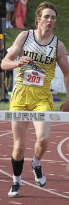 Chase Gracey competing in the 300 hurdles at State Track. Jill Coble