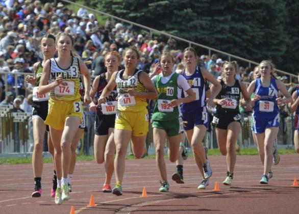 Peyton Paxton (left) and Callie Coble early in the 1600 Saturday during State Track. Alex Moore
