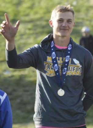 Clayton Moore with his Class D 300 hurdles gold medal. Alex Moore