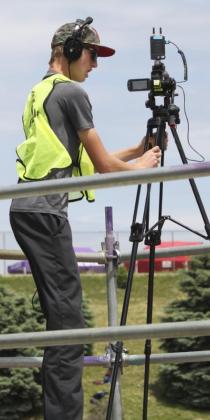 MHS junior Alex Moore spent State Track behind cameras of all kinds - not only taking photos for the Tribune, but also helping to live stream. Jill Coble