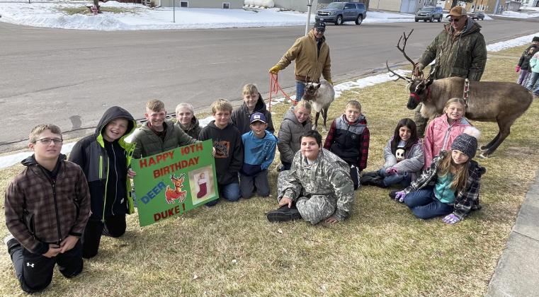 Mullen 4th grader Duke Miller had an early birthday surprise last Thursday, Nov. 30 when Flip Licking’s Stable Productions’ reindeer showed up at school to visit. Duke is pictured holding his sign, “Happy 10th Birthday ‘Deer’ Duke” with his classmates.