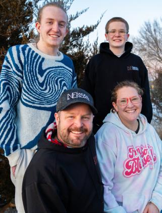 The Koch family pictured in 2024. From left: Hudson, 17, Jeremy, 41, Asher, 14 and Bailey, 39. The family, posing for a portrait outside their home near Eustis on Jan. 26, 2024, has long struggled with mental health issues. The family had found healing by sharing their story online through a Facebook page it created in 2014. Since then, Anchoring Hope for Mental Health has added more than 10,000 followers who routinely share their own stories of mental health. Chris Bowling