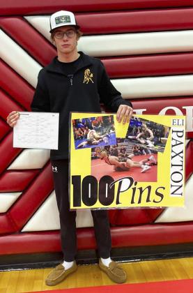 Eli Paxton celebrates his 100th win.