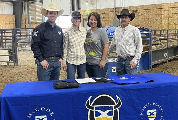 MHS senior Whitney Jennings recently signed her letter of intent to compete for the Mid-Plains Community College rodeo team in breakaway, team roping and barrel racing. Pictured l-r: MPCC Timed Events Coach Wyatt Clark, Whitney, Janelle and Royce Jennings. courtesy photo