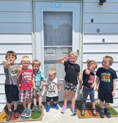 Sometimes it’s hard seeing our mommies and daddies leave to go to work, so that’s why at Lots of Love Day Care children have the Goodbye Mat! Pictured l-r: Chasin McIntosh, Mason Deibler, Ronin Lattin, Axton Stichka, Violet Stichka, Ady McIntosh, Aiden Stichka. Lori Freeze