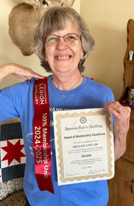 American Legion Auxiliary Unit 109 Membership Chairman Mary Lou Harding with awards received at State Department Convention. Eva Crawford