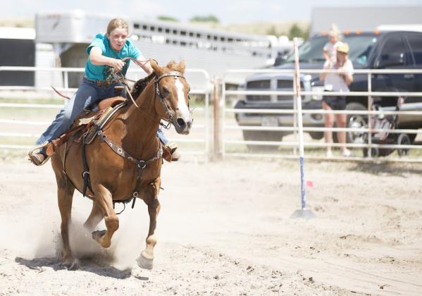 Marki Finney running the poles during Rodeo Bible Camp. Suzie/Casey Wahlgren