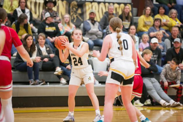 Lauren Schoonveld looks for a teammate to pass to last week against Valentine.