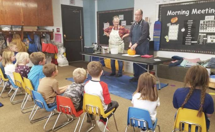 Teters teach kindergarten how to make a pumpkin pie