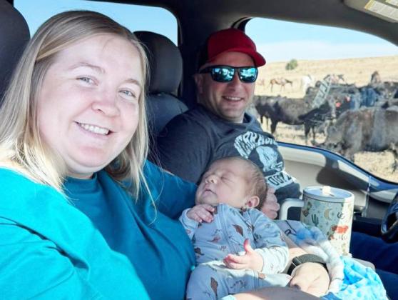 Brooks Hettinger’s first branding at 5 days old with mom and dad, Jaci and Brandon Hettinger. Jeri Edis