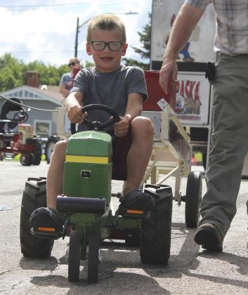 Cooper Ourada competes in the Pedal Tractor Pull. Gerri Peterson