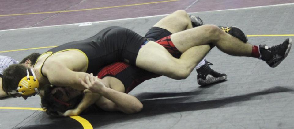 Sean Simonson placed 6th at 170 at State Wrestling.