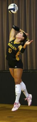 Ella Rice with a jump serve against Wallace last Tuesday. Megan Andersen