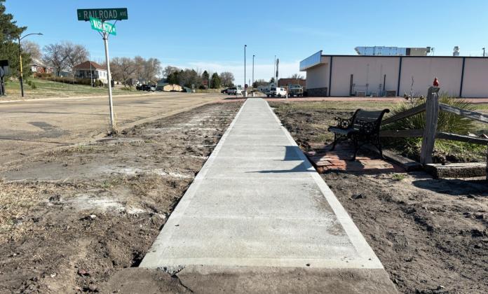 A long overdue improvement was recently made to the sidewalk on the south side of the railroad tracks, which had bulged up many years ago, by Licking Redi-Mix and Licking Construction. Gerri Peterson