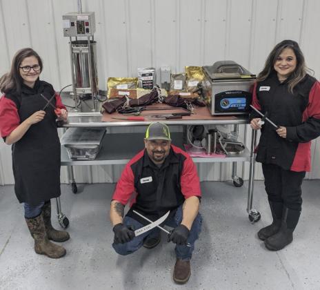 Xavier and Connie Garza with daughter Isabella (left) are pictured with some of the items purchased with the grant money. courtesy photo