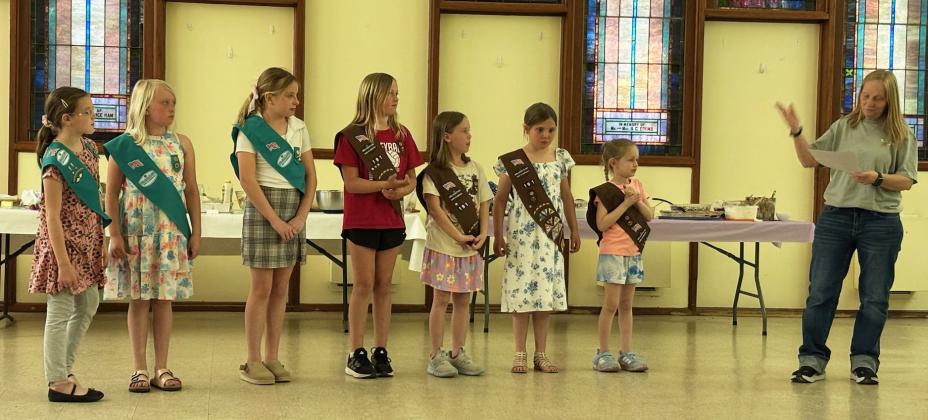 Brownie Girl Scouts, l-r: Anna Hessin, Daryl Deibler, Sadie Hoyt, Danielle Peterson, Kinley Crisp, Aislynn Connealy, Aurora Polt, leader Roxann Brown.