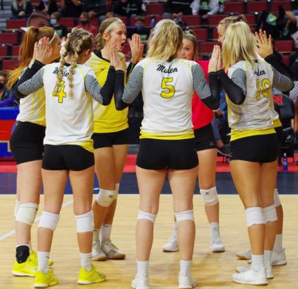 The Lady Bronco starters, pictured l-r: Kylie Licking, Alli Loughran, Samantha Moore, Hanna Marshall, Lindey Coble, Brooke McCully and Taylor Svoboda gather before a set at State. Barb McIntosh
