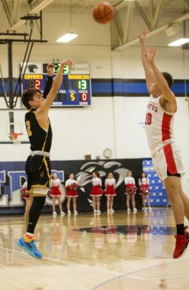 Trevor Kuncl with a 3-pointer last Tuesday.