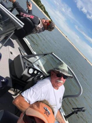 “Nothing like a day on the lake with these two,” Jennifer Peters said of her husband Todd and dad Chuck Anders.