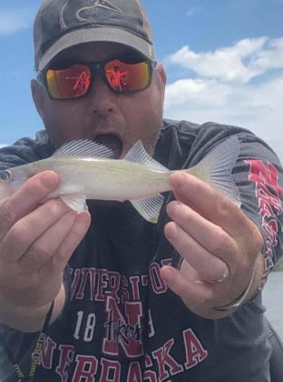 “Nothing like a day on the lake with these two,” Jennifer Peters said of her husband Todd and dad Chuck Anders.