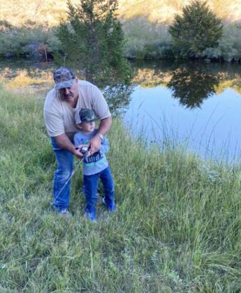 Grandpa Bryan Crisp and grandson Riggin Hollenbeck.