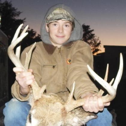 Jason Kraus with his first mule deer.