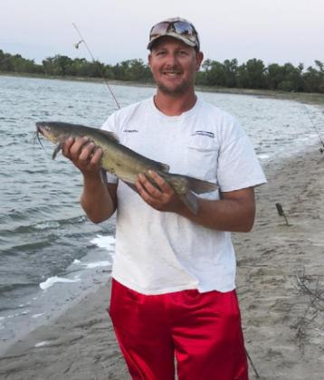 Joseph Deibler with a Merritt Reservoir catfish.