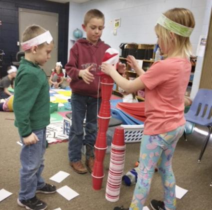 The kindergarten, 1st, and 2nd grade students participated in Read Across America Week by celebrating Dr. Seuss’ birthday last Thursday, March 2. They rotated through stations with a group and did a variety of activities. They even listened to a story with Mr. Mauler while enjoying a snack!