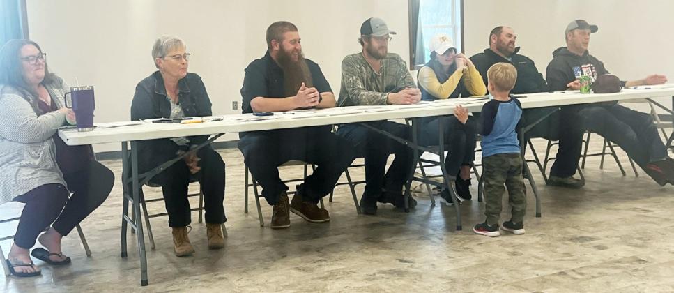 L-r: Jessie Cash, Deb Daly, Chad Myers, Devan Polt, Shelby Ridenour, Tanner Crisp and Josh Barnes with the youngest attendee at last week’s meeting, Arthur Polt. Gerri Peterson