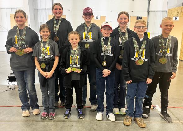 State BB Gun medalists, l-r: Adelyn O’Brien, Rainne O’Brien, Hannah O’Brien, Sadie Hoyt, Jessa O’Brien, Duke Miller, Hope Miller, Oakes Miller, Teal Peterson. Gerri Peterson