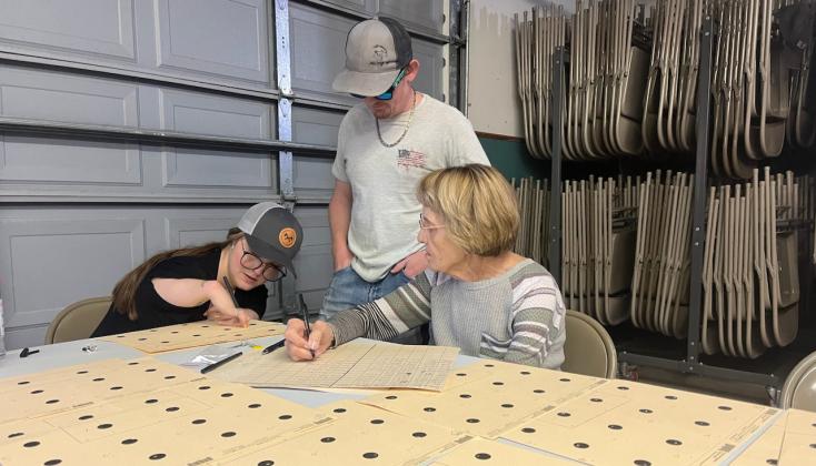 Three generations of Hoyts did the scoring at Mullen’s county fair shoot! Gracie Hoyt and Carolyn Hoyt are pictured with Connor Burns. Kyle Hoyt also scored the targets.