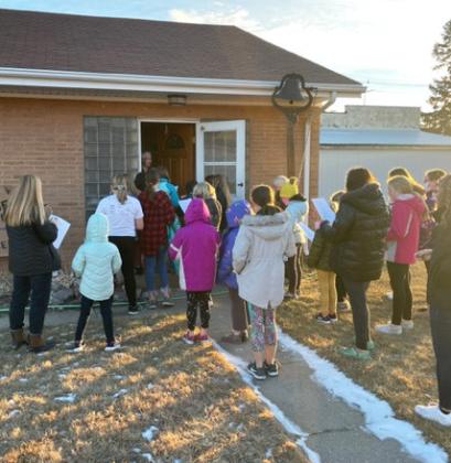 Mullen Girl Scouts Christmas caroling