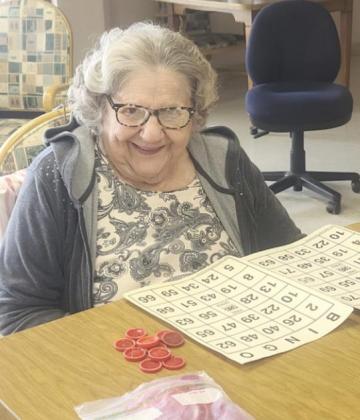 Florence Cooper getting ready to play Bingo.