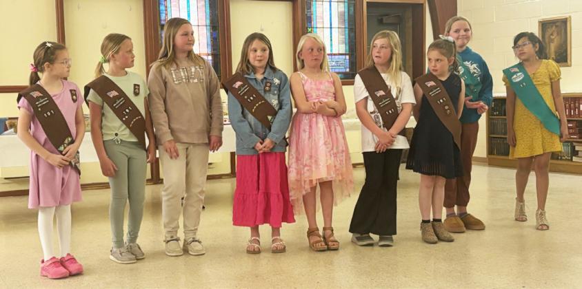 Brownie Girl Scouts, l-r: Anna Hessin, Danielle Peterson, Tatum Deibler, Sadie Hoyt, Daryl Deibler, Marki Finney and Aislynn Connealy. Junior Girl Scouts Ella Walz and Natalee Walker. Their leader is Roxann Brown.