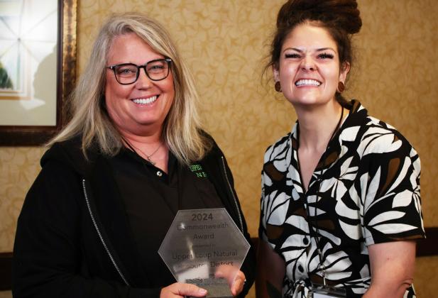 ULNRD General Manager Anna Baum (left) accepts the award. courtesy photo