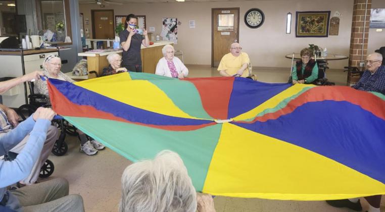 Doing a parachute exercise.
