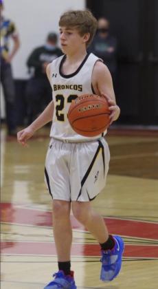 Kyle Finney brings the ball down the court last Saturday. Barb McIntosh