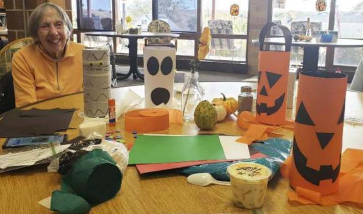 Sharon Carson with the Halloween windsocks that we made.