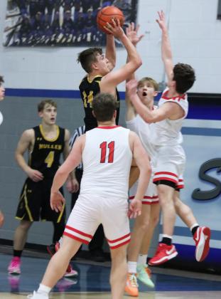 Jacob Walker puts up a shot in MNAC action. Carolee Brown