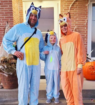 Ryan and Shelby Ridenour with their daughter Anna as Bluey characters last Halloween.