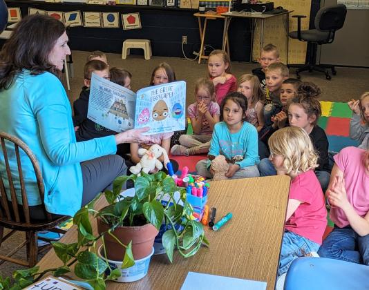 She may be “retired” from the ESU, but Crazy Lou (Lou Cox-Fornander) still stops in at Mullen Elementary from time to time. No one reads quite like Lou does and the kindergarten and first graders hung onto every word of “The Great Eggscape!” last Thursday. Donalee Barner