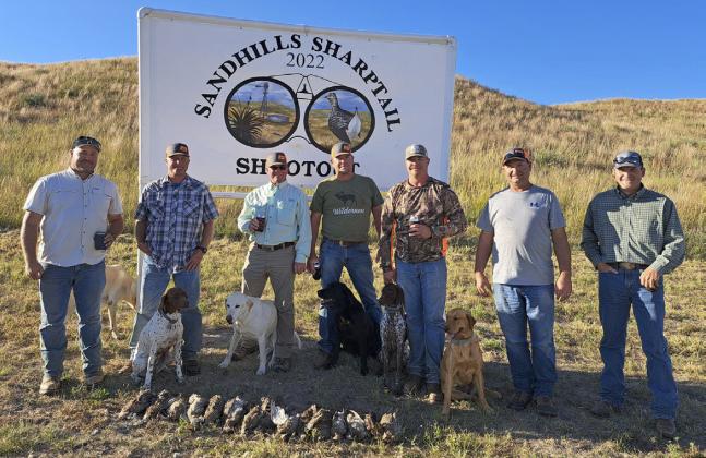 Grouse hunt 1st place Past Shooters team - Point ‘N’ Flush with their scorekeeper Brandon Boyer (left) and guide Jason Marshall (right). See more photos on the Sandhills Sharptail Shootout Facebook page.
