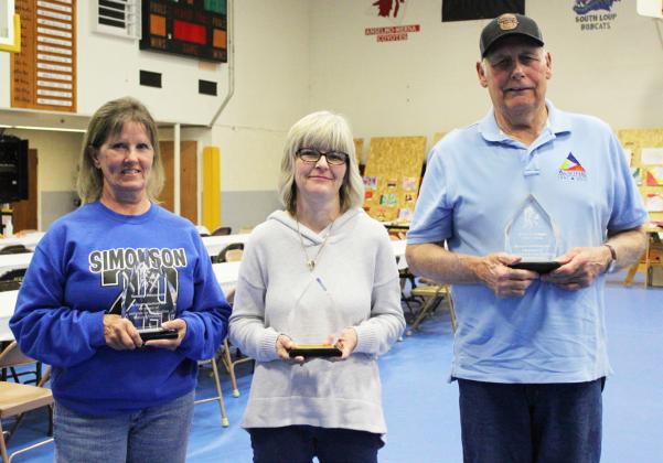Three of the five staff members retiring were present at Honors Night, l-r: Tammy Simonson, Kathy Leibhart, John G. Wright. Not present were Donalee Barner and Mark Ewoldt.