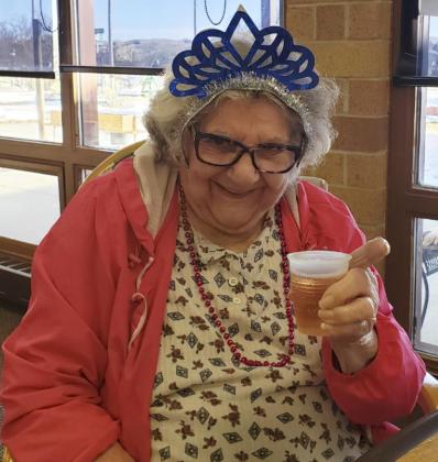 Florence Cooper enjoying some bubbly.