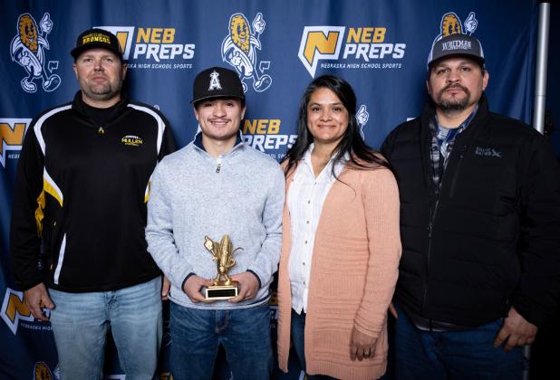 L-r: Mullen Bronco Head Football Coach Wade Marsh and Nicholas Gonzalez with his parents, Lorena and Manuel Gonzalez. courtesy photo