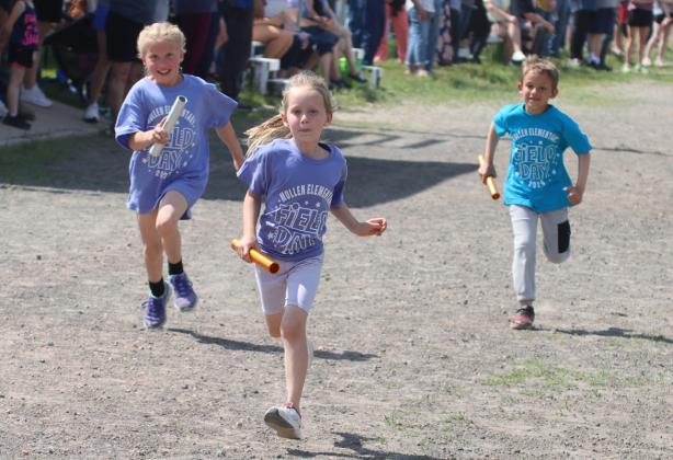 Competing in the kindergarten and 1st grade relay, l-r: Charlotte Connealy, Aurora Polt, Austin Smith.