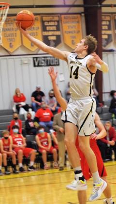 Jaden Emerson with a layup in the season opener against Sutherland last Thursday. Barb McIntosh