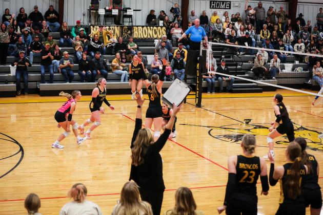 The Lady Broncos on the floor, Head Coach Nichole Ourada and the players on the bench and Mullen fans celebrate as the Broncos clinched their trip to State Volleyball last Saturday afternoon in Mullen. Megan Andersen